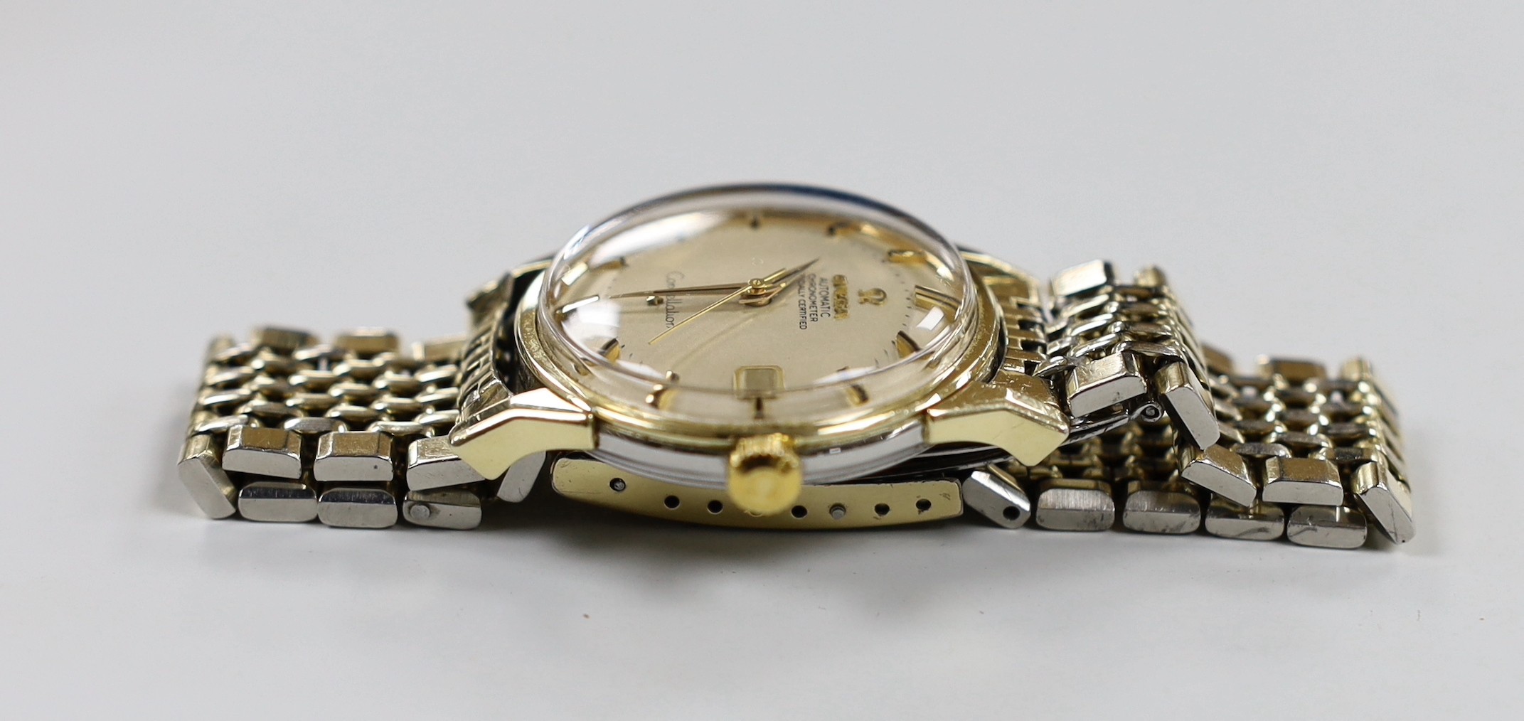 A gentleman's 1960's? steel and gold plated Omega Constellation Automatic Chronometer 'pie-pan' dial wrist watch, on steel and gold plated Omega bracelet, case diameter 35mm.